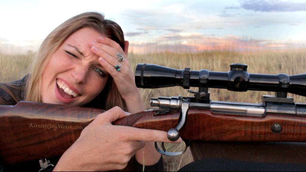 scope bite holding forehead on gun words